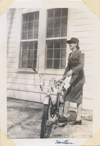 WAAC member with bicycle