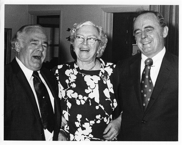 Dr. Louise Holborn (center) stands with Deputy Consul General of the the Federal Republic of Germany, Dr. Wolf Mueller (left), and an unidentified man; Dr. Mueller awarded Dr. Holborn the Order of Merit from the Federal Republic of Germany