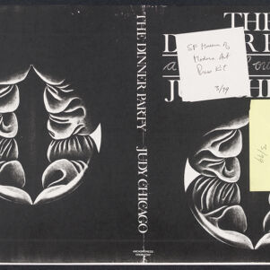 Black-and-white photocopy of a book jacket with two images of the same circular illustration of a vaginal shape flanked by organic ridges and folds Parts of the jacket are obscured by two annotated sticky notes, one white, one yellow