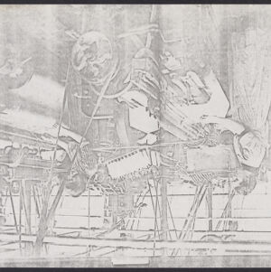 Black-and-white photocopy of a photograph of a woman standing beside an industrial loom upside down with handwritten annotations
