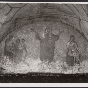 Black-and-white photograph of an arched ceiling with a mural of a robed man standing with outstretched arms flanked by seated figures on either side