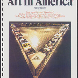Color reproduction of a cover of Art in America with a photograph of a triangular table with an open center lined with place settings