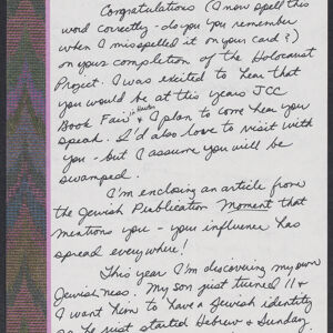 Handwritten letter on stationery printed with a decorative border