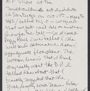 Handwritten note in black ink on white paper