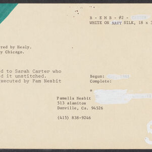 Typewritten note card with handwritten annotations in correction fluid and black ink with green ink in the upper left corner