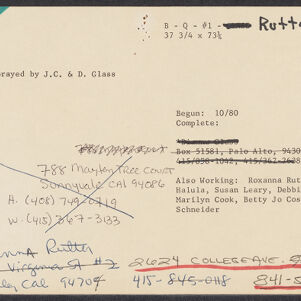 Typewritten note card with handwritten annotations in black, blue and red ink and green ink in the upper left corner