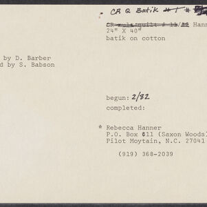 Typewritten note card with handwritten annotations in black ink with black ink in the upper left corner