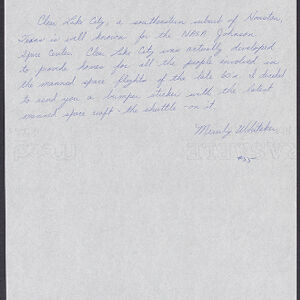 Handwritten letter in blue ink on white paper