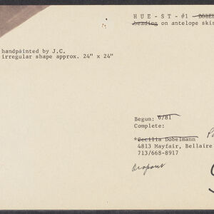 Typewritten note card with handwritten annotations in black ink and gray ink in the upper left corner