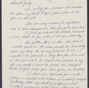 Handwritten letter in blue ink on white paper with an ink stamp at the top