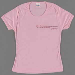 Pink t-shirt with a quote from Judy Chicago in dark pink text