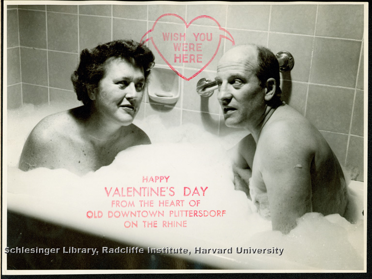Valentine's day card created and sent by Paul and Julia Child depicting the Childs in a bubble bath saying "wish you were here" in a heart speech bubble