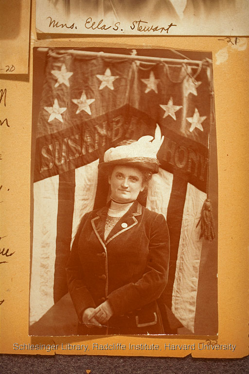  Portrait of Susan B. Anthony in front of a stars and stripes banner that reads “Susan B. Anthony.”