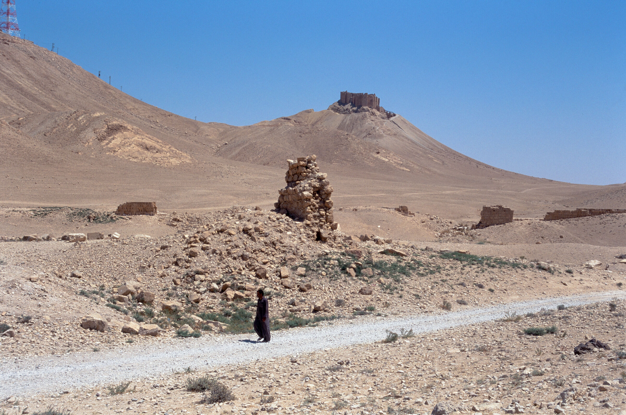 Photo of the Valley of the Tombs, including castle in the background (Palmyra, Syria)