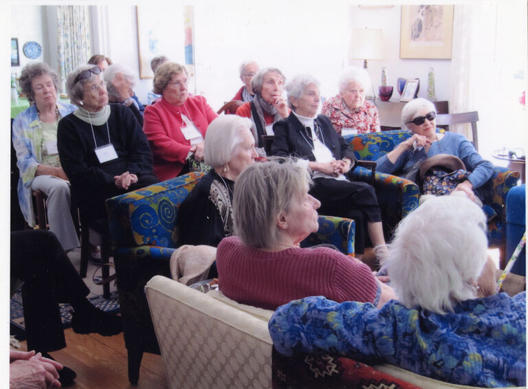 Mothers' Thursday Club members seated facing front at a meeting. 