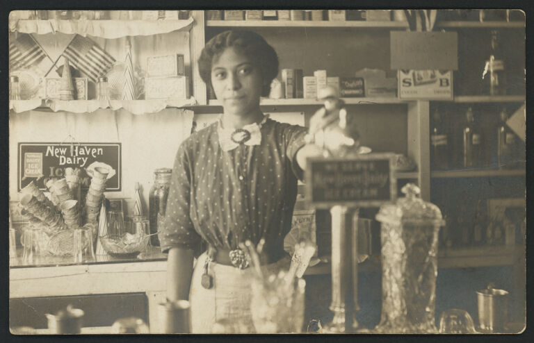  Anna Louise James behind the soda fountain in the James’ pharmacy