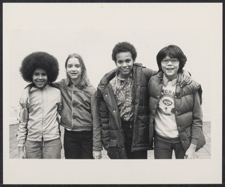Group portrait of four pre-teens.