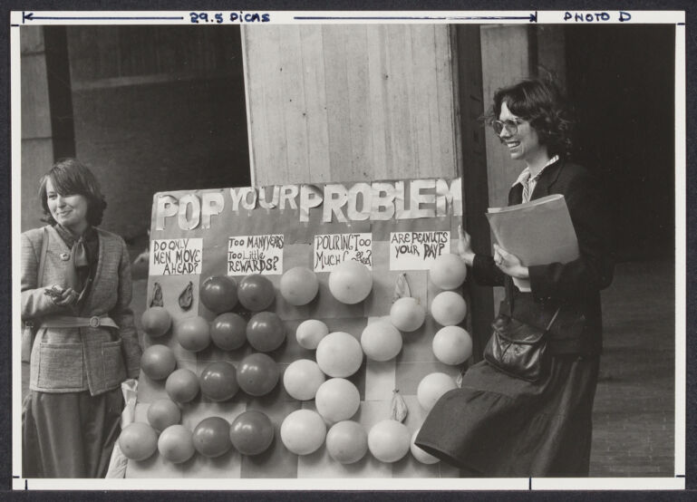 "Pop your Problem" balloon display at 9to5's Working Women's Fair , 1982