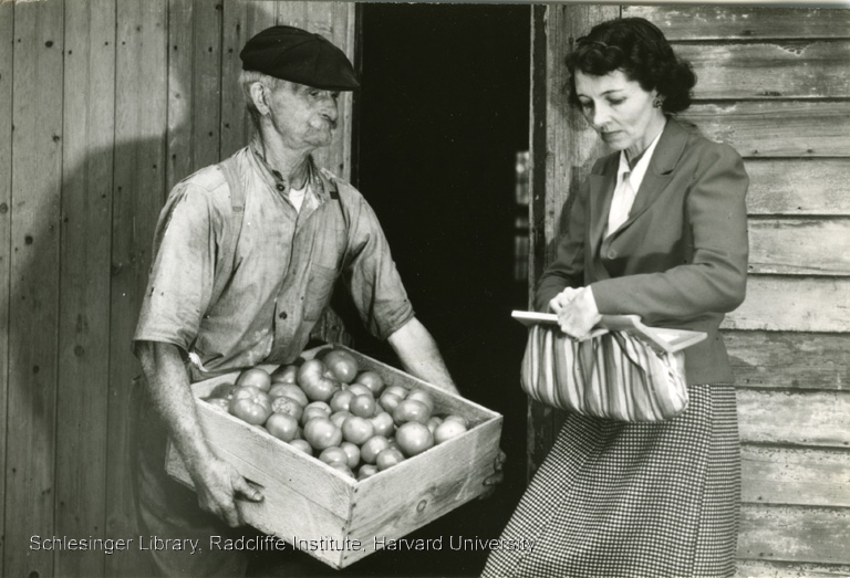  Isabel Keenan purchasing crated tomatoes for canning. 