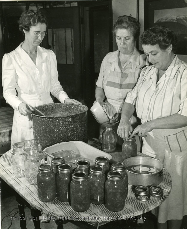 Women filling jars for canning. ca. 1942-1944.
